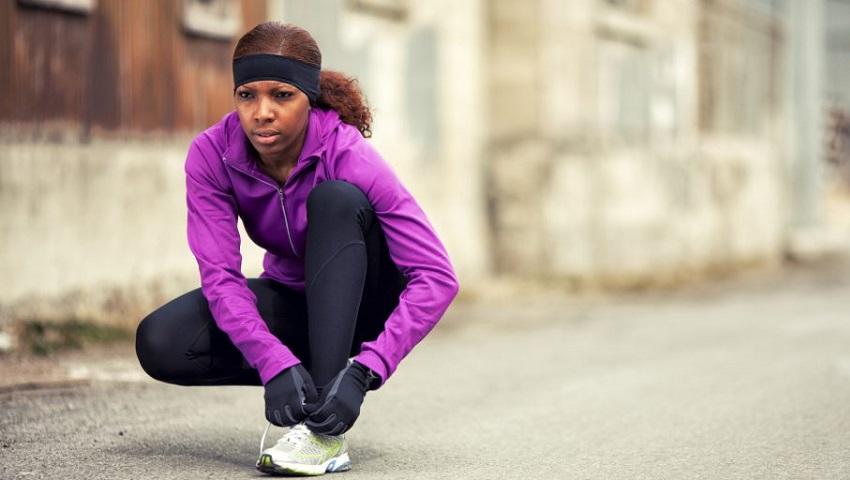 photo-of-woman-tying-shoelace.jpg