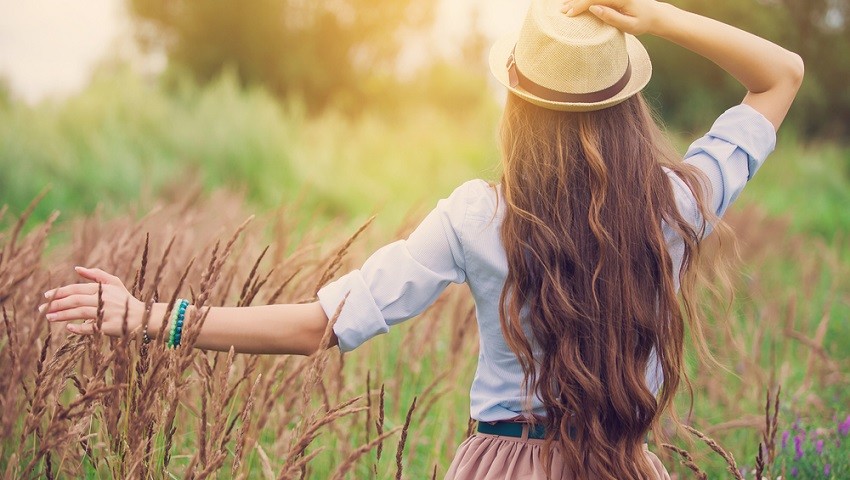 Woman With Long Hair In The Fields