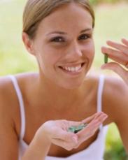 photo-of-woman-holding-green-coffee-supplements.jpg
