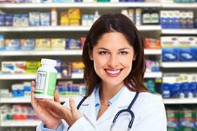woman-holding-bottle-of-supplement.jpg