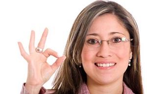 photo-of-smiling-woman-with-okay-hand-gesture.jpg