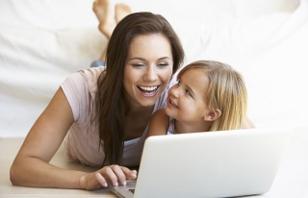 happy-mother-and-daughter-using-laptop.jpg