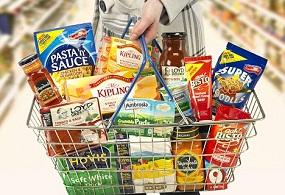 woman-holding-basket-of-processed-foods.jpg