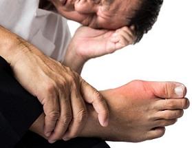 photo-of-a-man-suffering-from-pain-holding-his-foot.jpg