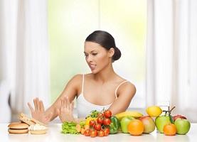 photo-of-woman-with-fruits-and-junk-food.jpg