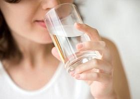 woman-drinking-glass-of-water.jpg