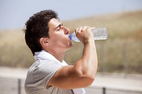 photo-of-man-drinking-bottle-of-water.jpg