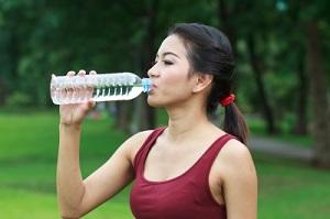 woman-drinking-bottle-of-water.jpg