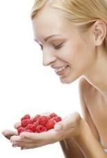 photo-of-woman-holding-raspberry-ketone-fruits.jpg