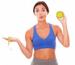 photo-of-a-woman-holding-tape-measure-and-garcinia-fruit.jpg
