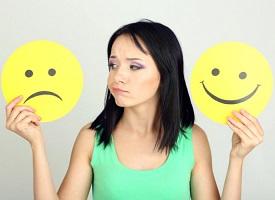 photo-of-woman-holding-different-smileys.jpg