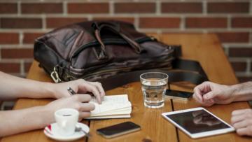 table-with-bag-gadgets-and-glasses.jpg