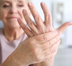 Senior Woman Holding Her Hand