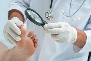 Doctor Examining Patient's Foot