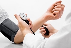 Doctor measuring blood pressure