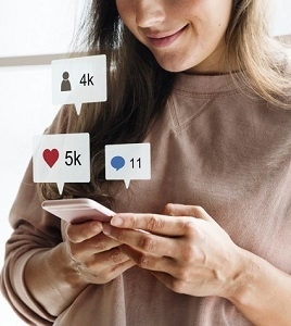 Woman using a smartphone social media concept